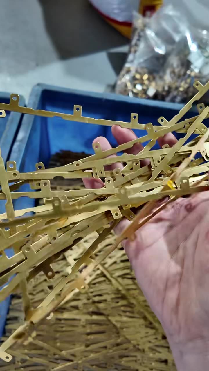Custom formed brass strip parts after pressing and forming