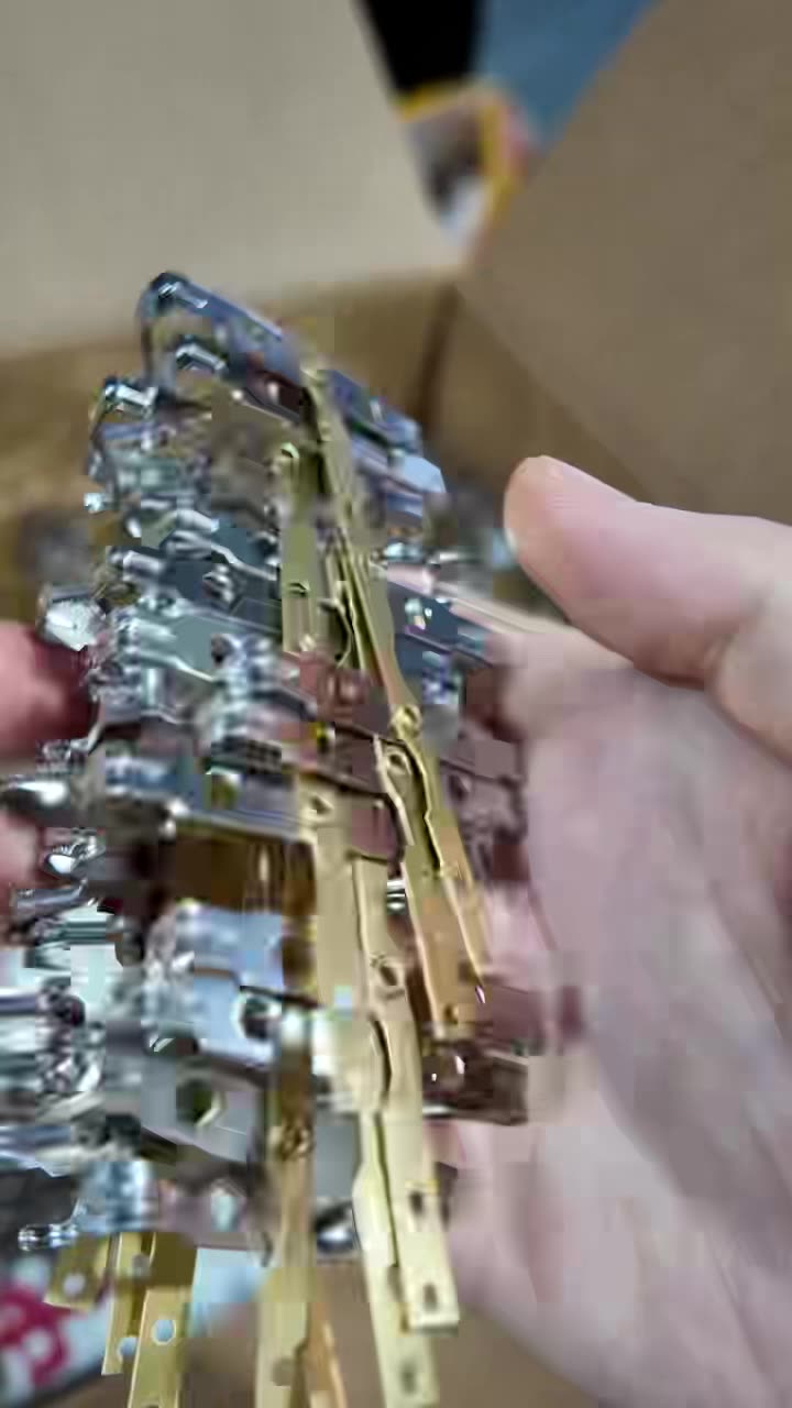 Assembled brass contact strip with socket inserts